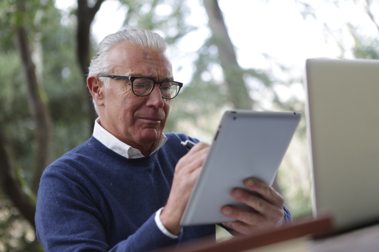 Man using a laptop for online banking